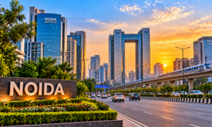 Gurugram to Noida cab with modern city skyline